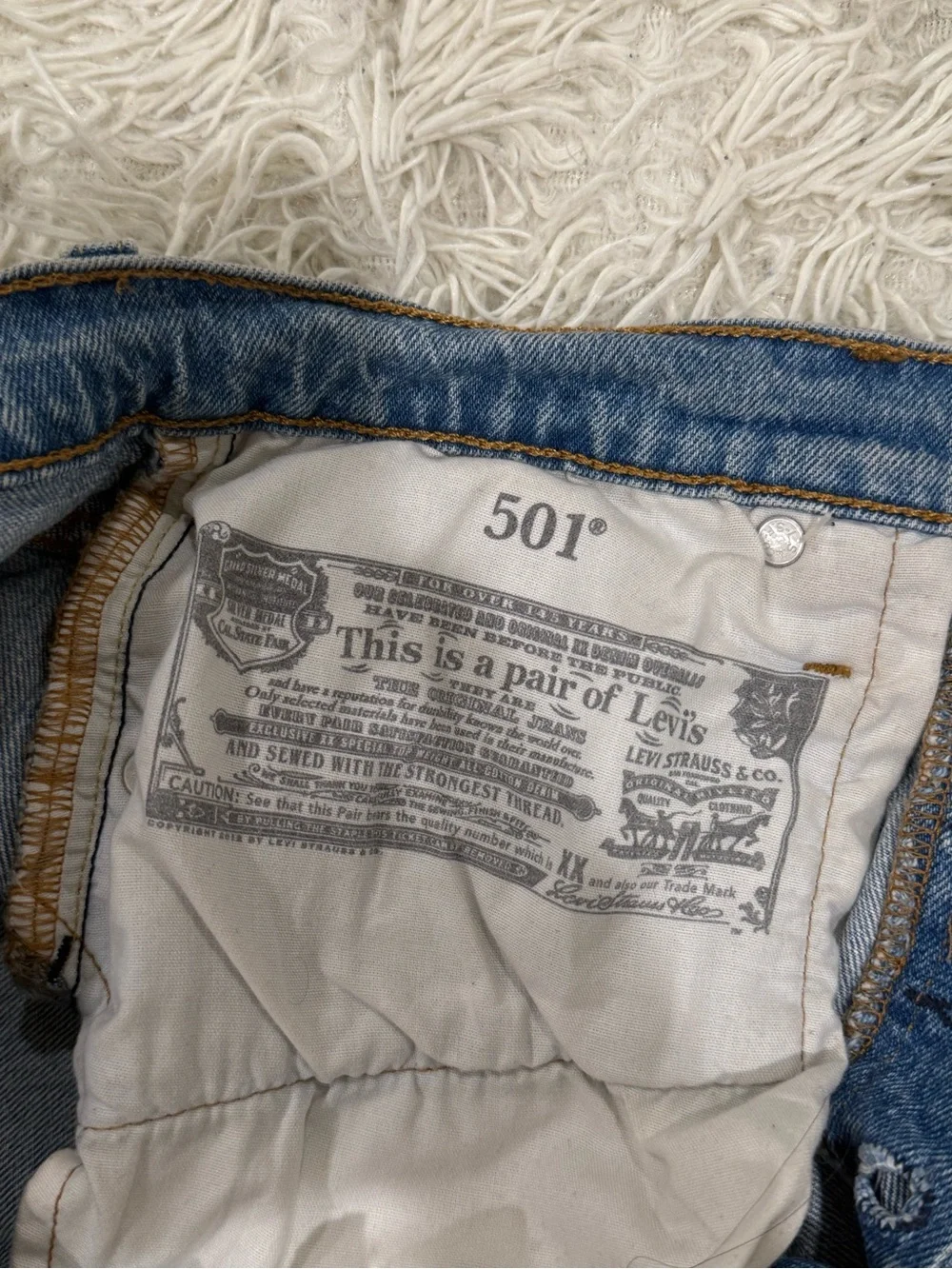 Levi’s High-Rise Distressed Denim Shorts - Light Blue